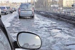 «Киевавтодор» обещает ликвидировать ямы на дорогах столицы ко Дню Киева